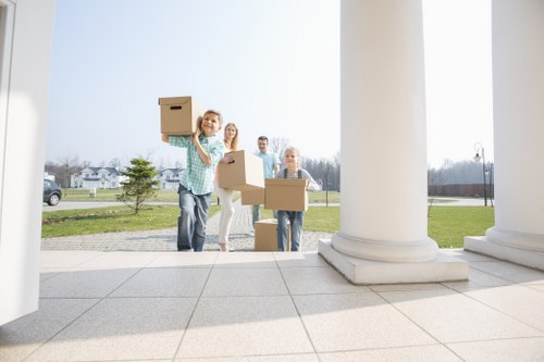 Loading furniture into a moving truck in Elmpark