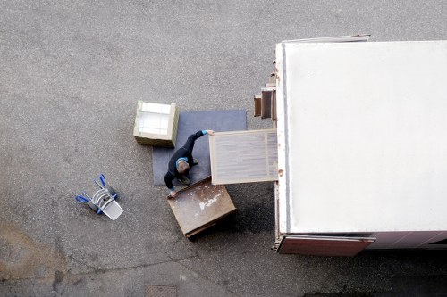 Packed office boxes and equipment ready for local commercial relocation