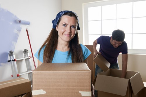 Packed business equipment ready for transport during a move in Elmpark