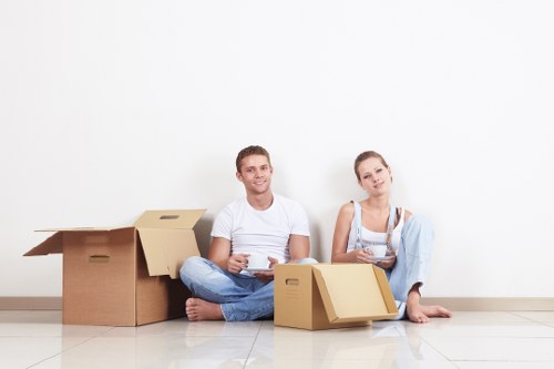 Packed boxes and furniture prepared for a local Elmpark house removal