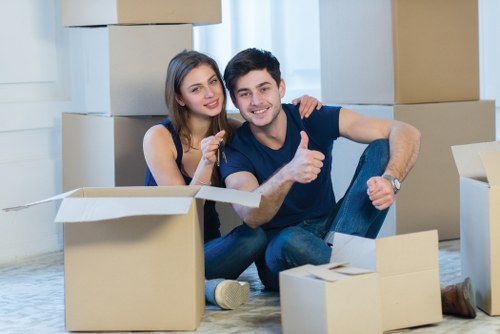 Packed moving boxes and protected items ready for transport