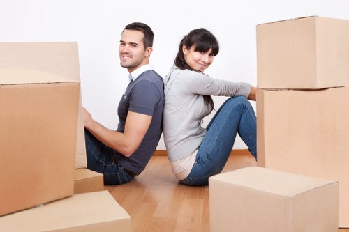 Furniture pick-up service removing a bed and wardrobe from an Elmpark home