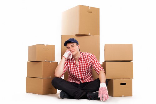 Packed boxes and furniture ready for transport on moving day